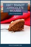 A Pinterest Graphic. A spoon filled with Brandy Chocolate Mousse.
