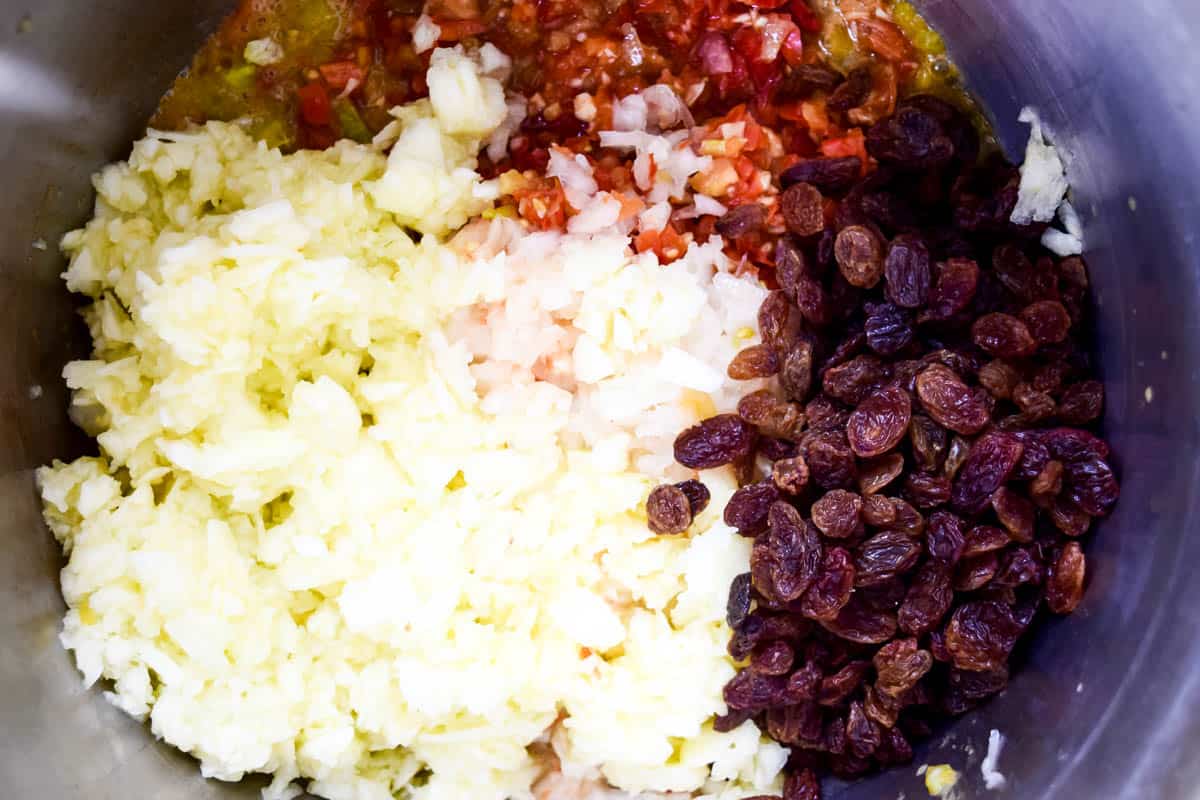 Blended ingredients of Autumn chutney with sultanas added.