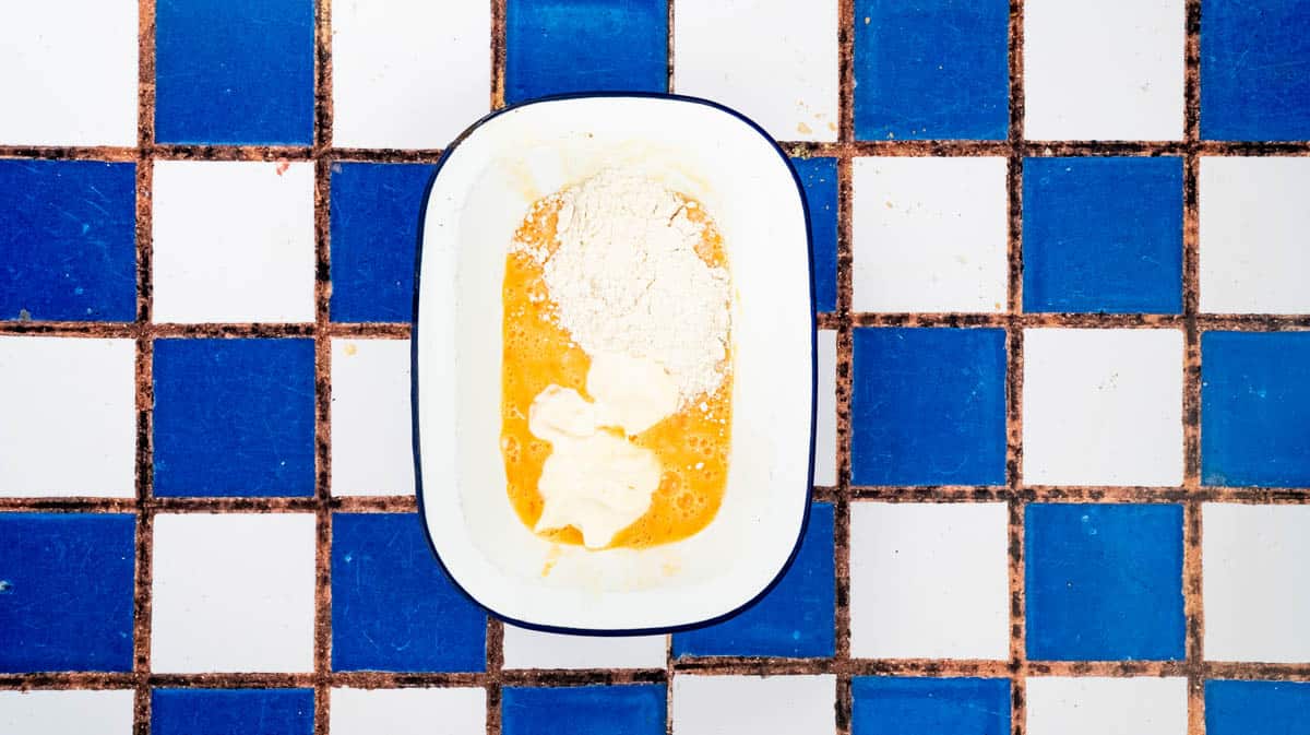Eye shadow bowl filled with beaten egg, flour and mayonnaise.