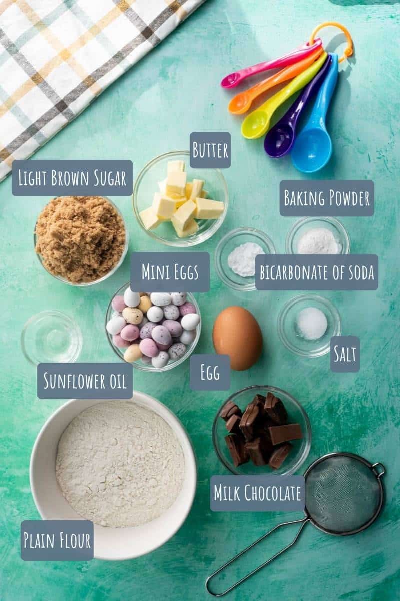 A labelled photo with all the ingredients needed to make mini egg biscuits