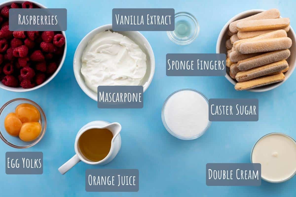 A labelled photo of all the ingredients needed to make an alcohol-free Raspberry Tiramisu.
