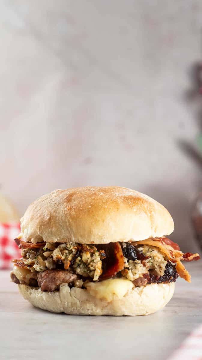 A front view of the finished burger with all the fillings inside.